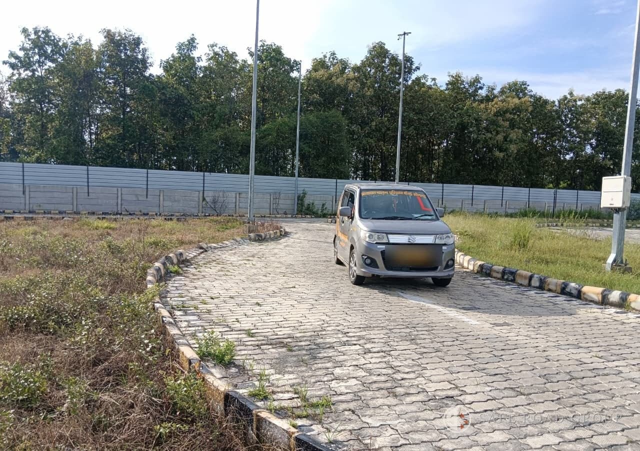 A learner car on the centre's circuit with the L plate up